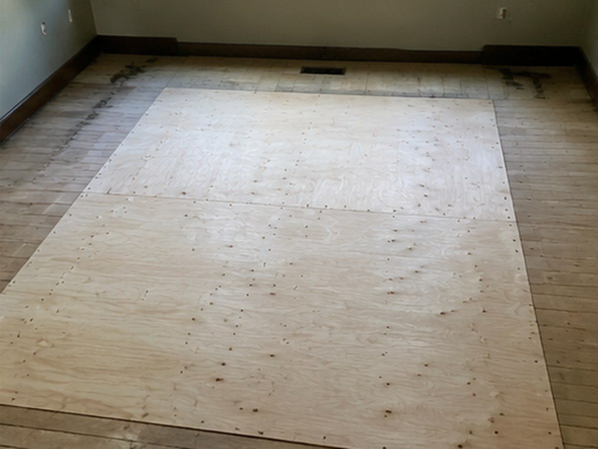 Subfloor repair and levelling before cabinets go down