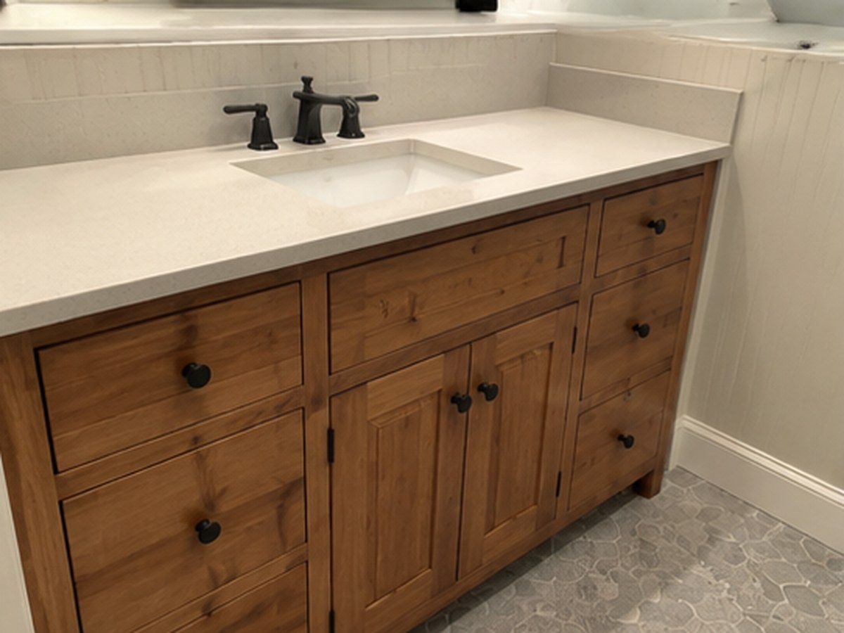Kitchen and bath carpentry around new fixtures
