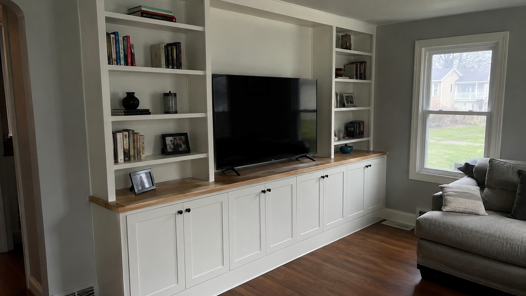 Custom built-in bookshelves and cabinetry in a home